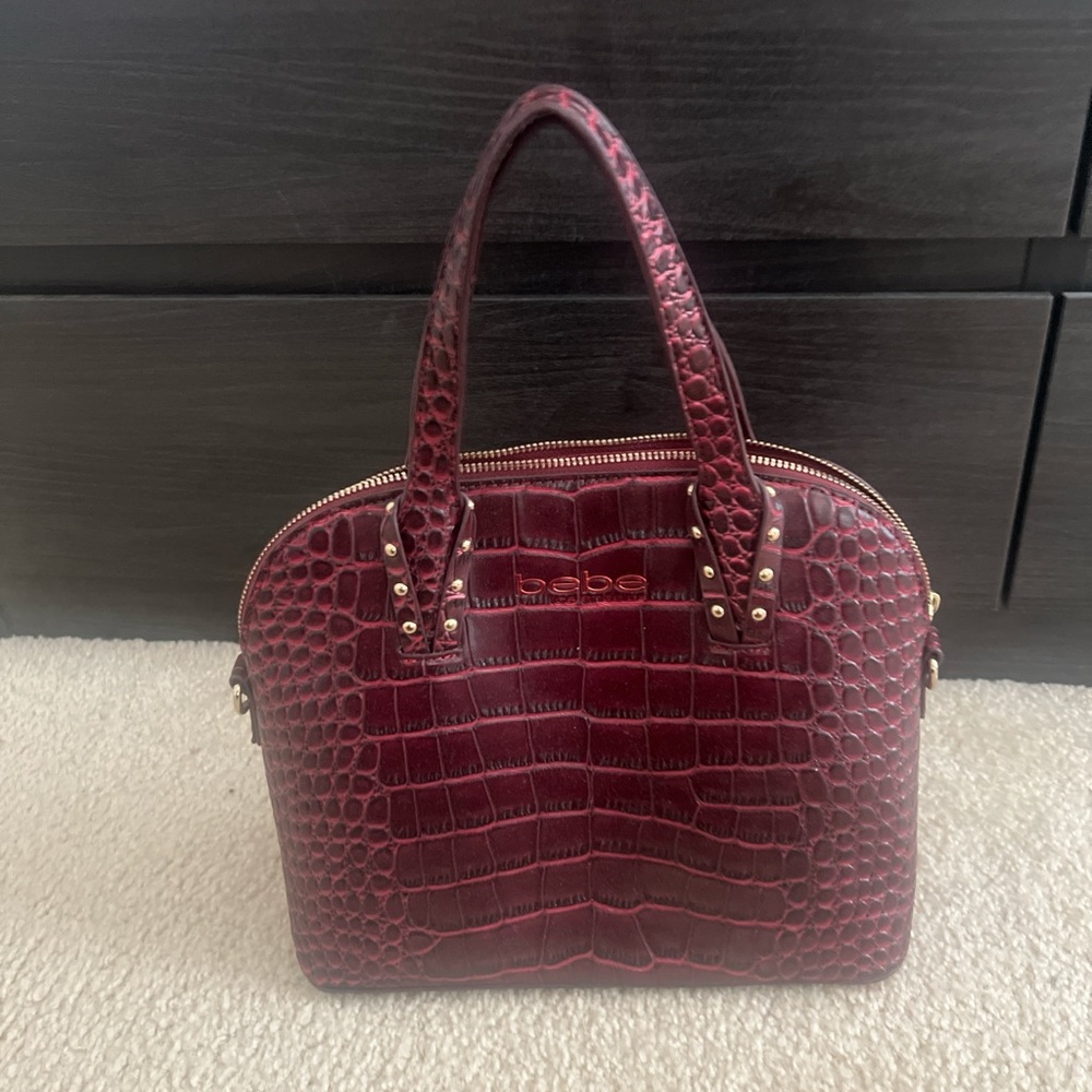 Bebe faux crocodile handbag in burgundy